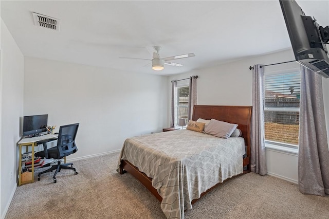 5642 Victor Lara Ortegon St, Corpus Christi, TX 78417 - bedroom with carpet flooring, a desk, and a ceiling fan