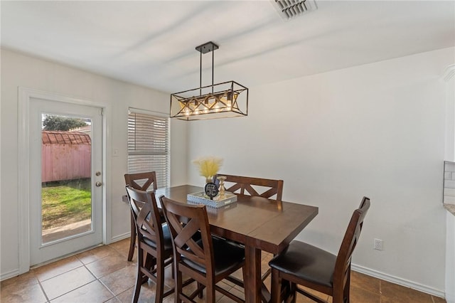 5642 Victor Lara Ortegon St, Corpus Christi, TX 78417 - dining area featuring tile patterned flooring and a chandelier
