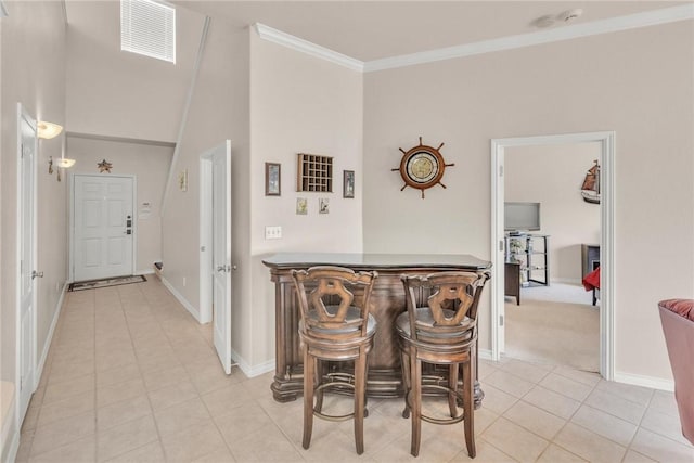 15410 Grass Cay Ct Unit A, Corpus Christi, TX 78418 - interior space featuring light tile patterned floors, visible vents, baseboards, and a dry bar