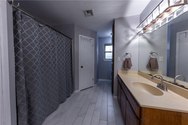 2413 Cricket Hollow St, Corpus Christi, TX 78414 - full bathroom with vanity and baseboards