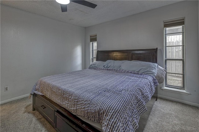 2413 Cricket Hollow St, Corpus Christi, TX 78414 - bedroom with baseboards, a textured ceiling, carpet flooring, and a ceiling fan