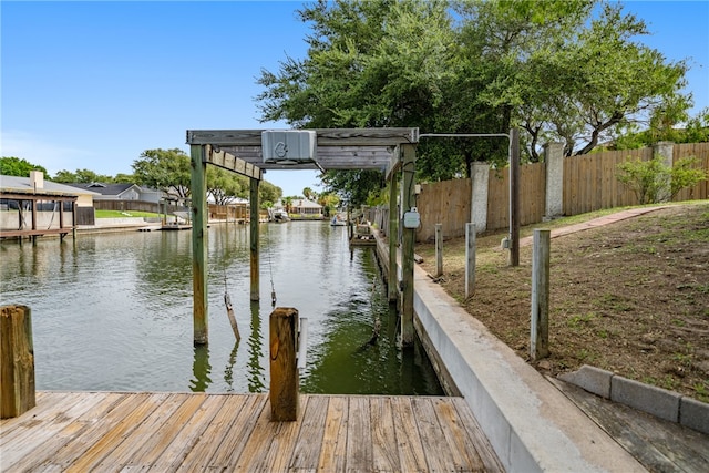 view of dock with a water view