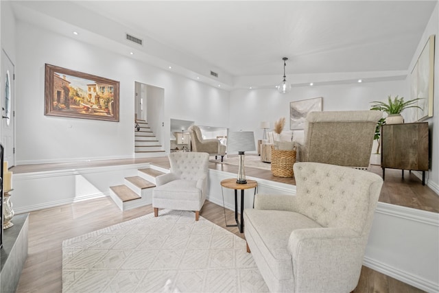 sitting room with light hardwood / wood-style flooring