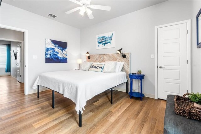 15022 Beach Walk, Corpus Christi, TX 78418 - bedroom with ceiling fan and wood-type flooring