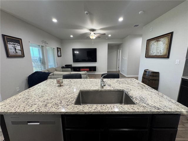 2682 Excelsior Blvd, Corpus Christi, TX 78415 - kitchen with a sink, a kitchen island with sink, a ceiling fan, dishwasher, and open floor plan