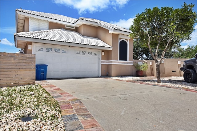 view of front of property featuring a garage