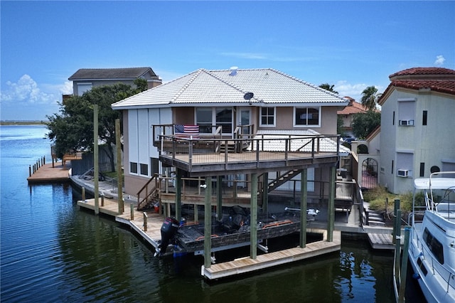 dock area with cooling unit and a water view