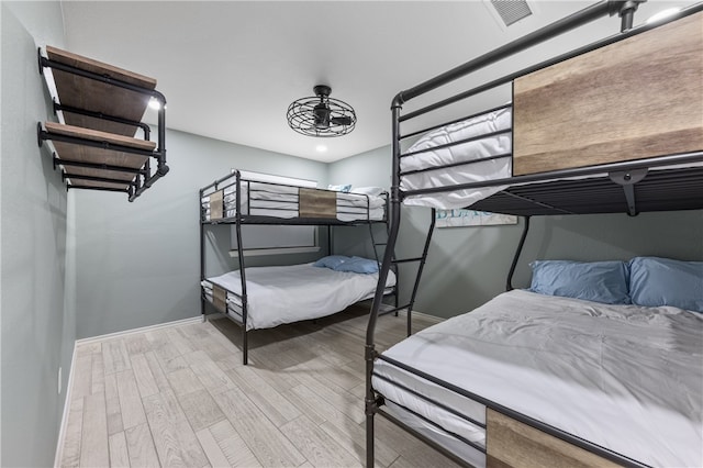 bedroom featuring light hardwood / wood-style floors