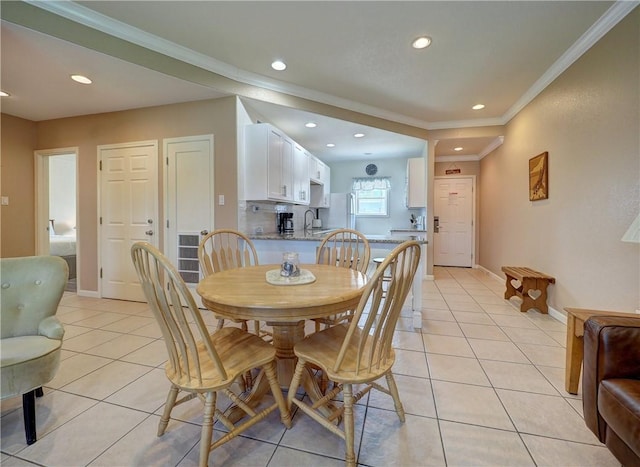 700 Island Retreat Rd Unit 37, Port Aransas, TX 78373 - dining space featuring recessed lighting, light tile patterned floors, ornamental molding, and baseboards