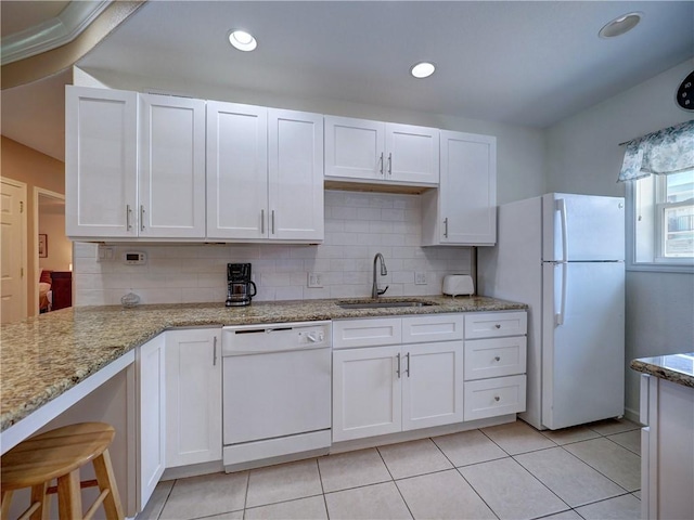 700 Island Retreat Rd Unit 37, Port Aransas, TX 78373 - kitchen featuring white appliances, a sink, white cabinetry, backsplash, and recessed lighting