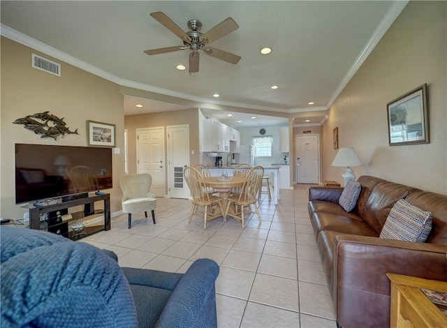 700 Island Retreat Rd Unit 37, Port Aransas, TX 78373 - living area featuring crown molding, light tile patterned floors, a ceiling fan, recessed lighting, and baseboards