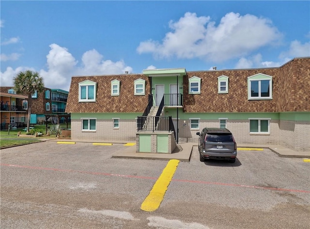700 Island Retreat Rd Unit 37, Port Aransas, TX 78373 - view of property featuring uncovered parking
