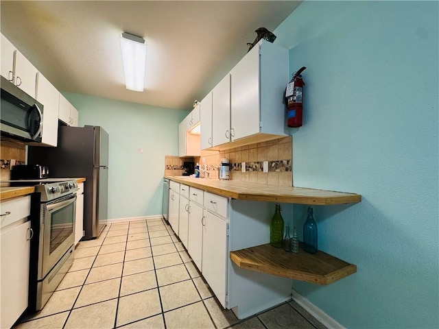 kitchen with white cabinets and stainless steel appliances