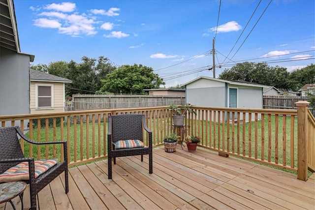 742 Sheridan Dr, Corpus Christi, TX 78412 - wooden terrace featuring an outbuilding