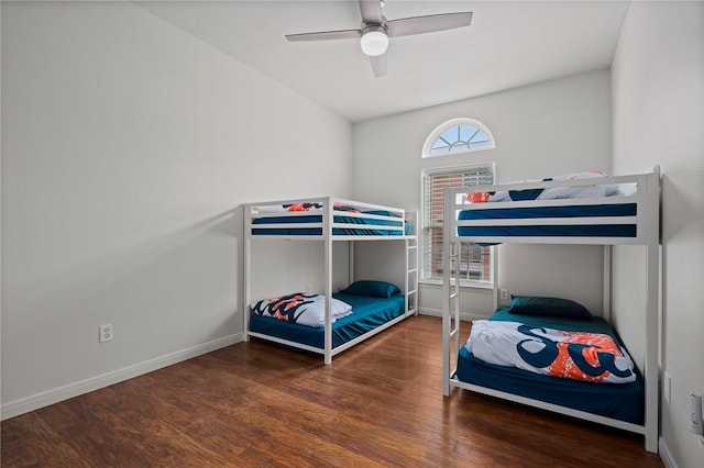 bedroom featuring ceiling fan and dark hardwood / wood-style flooring