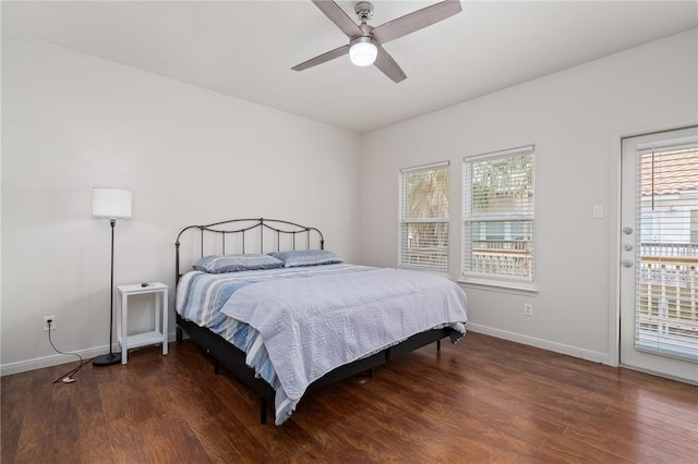 bedroom featuring ceiling fan, access to exterior, and dark hardwood / wood-style floors