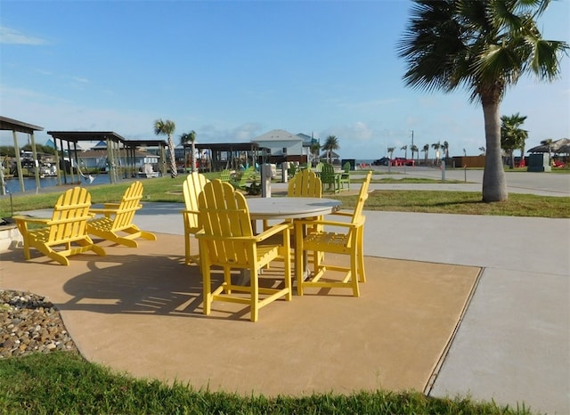 view of playground featuring a water view