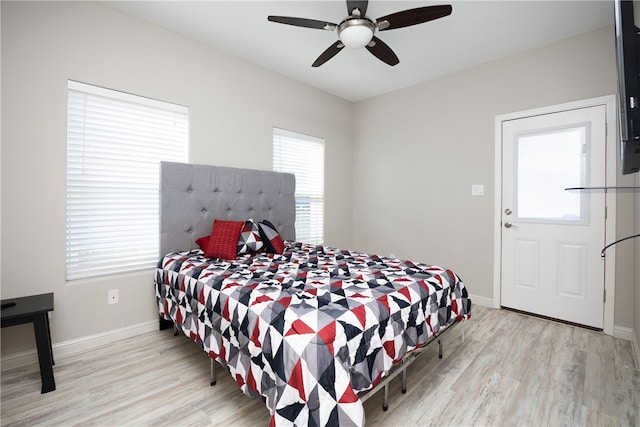 bedroom featuring ceiling fan and light hardwood / wood-style flooring