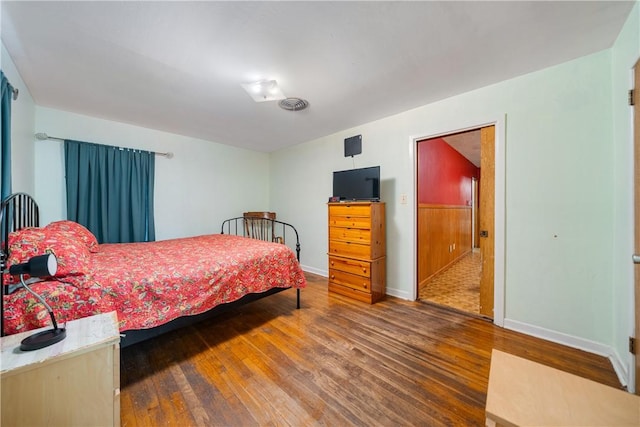 bedroom featuring hardwood / wood-style floors