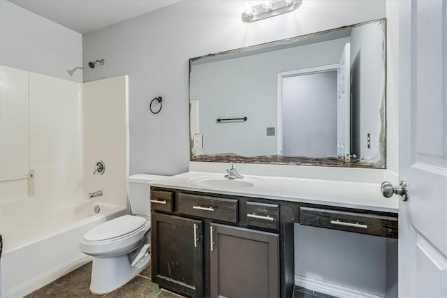 full bath featuring toilet, tile patterned flooring, bathtub / shower combination, and vanity