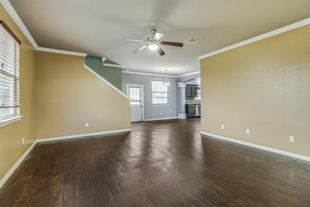 unfurnished living room with dark wood-type flooring, visible vents, baseboards, and a ceiling fan