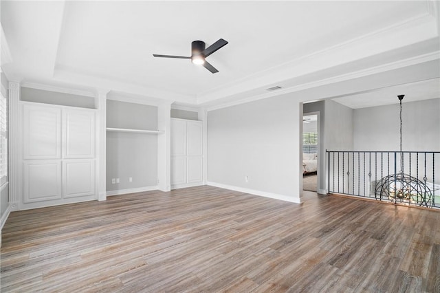 4589 Teal Dr, Corpus Christi, TX 78410 - unfurnished bedroom featuring a raised ceiling, light wood-style floors, ornamental molding, and visible vents