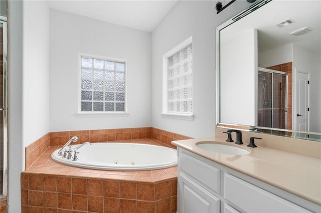 4589 Teal Dr, Corpus Christi, TX 78410 - full bath with a shower stall, vanity, a whirlpool tub, and visible vents