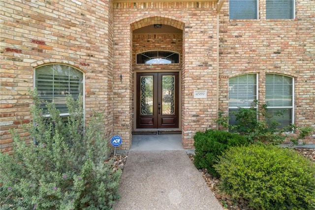 4589 Teal Dr, Corpus Christi, TX 78410 - view of exterior entry with french doors and brick siding