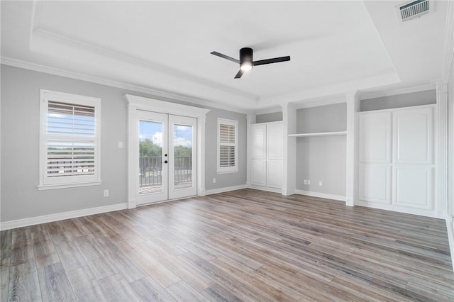 4589 Teal Dr, Corpus Christi, TX 78410 - unfurnished bedroom with a tray ceiling, access to exterior, french doors, and visible vents