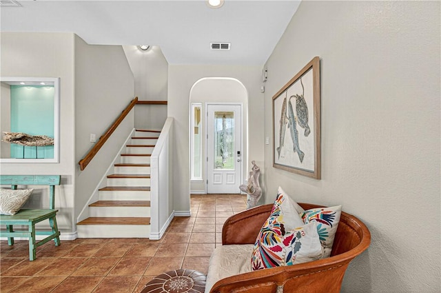 973 Pompano Dr, Aransas Pass, TX 78336 - entryway with stairway, recessed lighting, and tile patterned floors