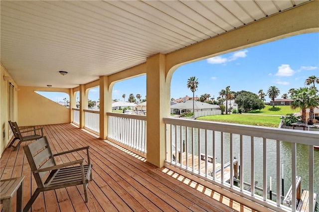 973 Pompano Dr, Aransas Pass, TX 78336 - wooden terrace featuring a water view and a residential view
