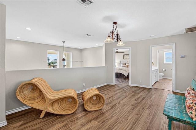 973 Pompano Dr, Aransas Pass, TX 78336 - sitting room featuring healthy amount of natural light, wood finished floors, a ceiling fan, and recessed lighting