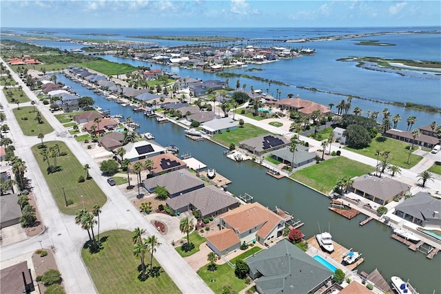 973 Pompano Dr, Aransas Pass, TX 78336 - aerial view of residential area featuring a large body of water