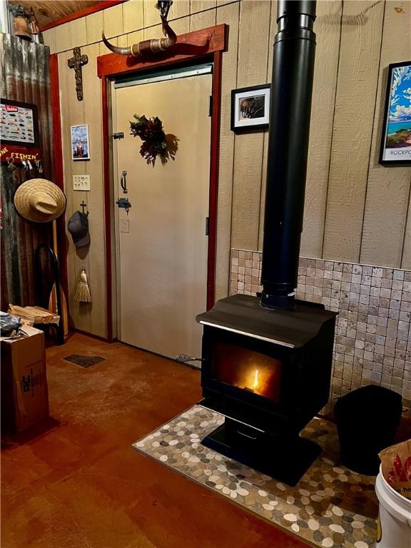 interior space with a wood stove