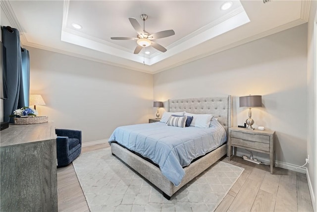 6421 Aikman, Corpus Christi, TX 78414 - bedroom featuring crown molding, baseboards, light wood-type flooring, a raised ceiling, and recessed lighting