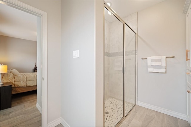 6421 Aikman, Corpus Christi, TX 78414 - ensuite bathroom with a shower stall and baseboards