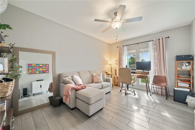 6421 Aikman, Corpus Christi, TX 78414 - living area with a ceiling fan and light wood-style flooring