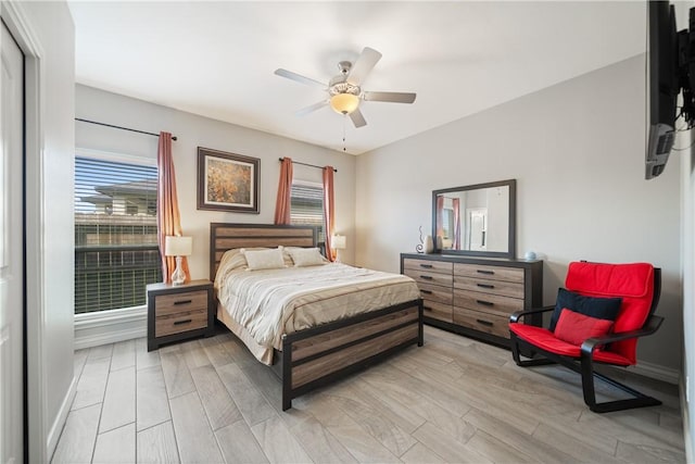 6421 Aikman, Corpus Christi, TX 78414 - bedroom featuring light wood finished floors, baseboards, and ceiling fan