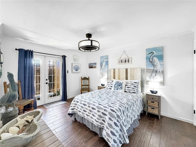 bedroom featuring baseboards, dark wood-style floors, access to exterior, and french doors