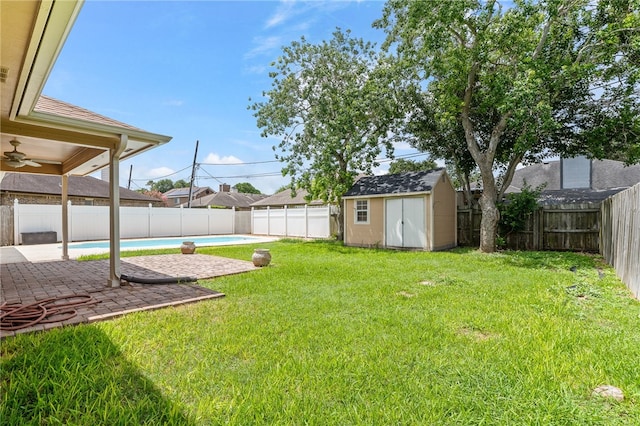 4241 Aaron Cv, Corpus Christi, TX 78413 - fenced backyard with a storage shed, a patio area, and ceiling fan