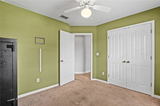 4241 Aaron Cv, Corpus Christi, TX 78413 - unfurnished bedroom featuring carpet, a closet, and ceiling fan