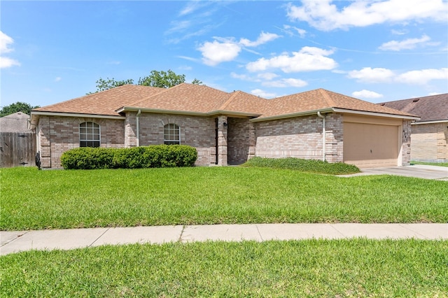 4241 Aaron Cv, Corpus Christi, TX 78413 - single story home featuring a garage, roof with shingles, brick siding, and concrete driveway