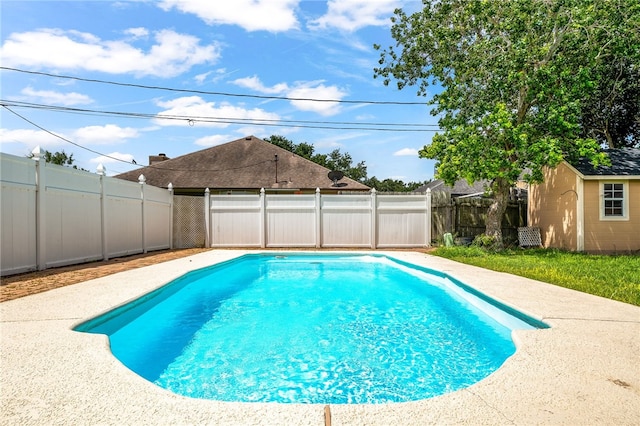 4241 Aaron Cv, Corpus Christi, TX 78413 - view of pool featuring a fenced backyard and a storage unit