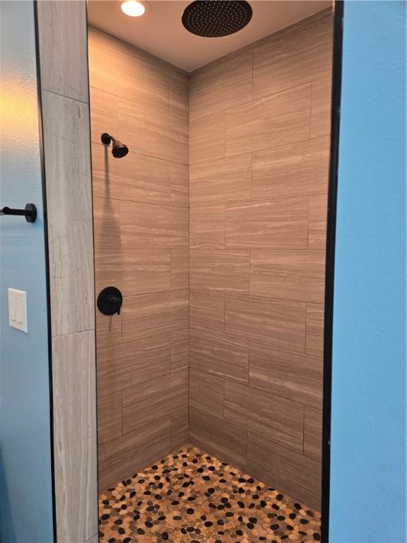 16125 Seagrape St, Corpus Christi, TX 78418 - full bathroom featuring a tile shower
