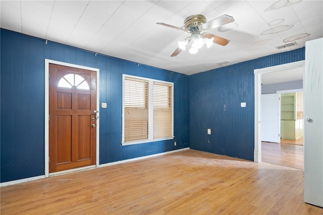 foyer featuring ceiling fan and hardwood / wood-style flooring