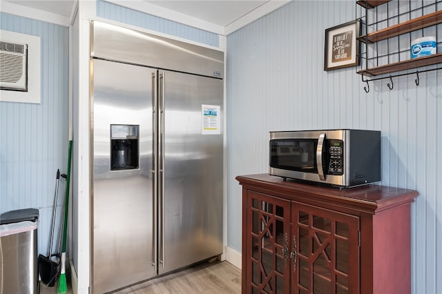 kitchen with light wood-type flooring and stainless steel appliances