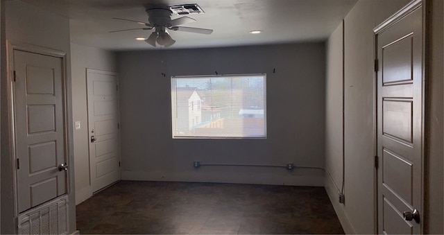 unfurnished room featuring ceiling fan