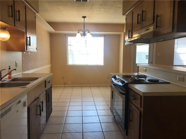 kitchen featuring black / electric stove, white dishwasher, under cabinet range hood, a sink, and baseboards