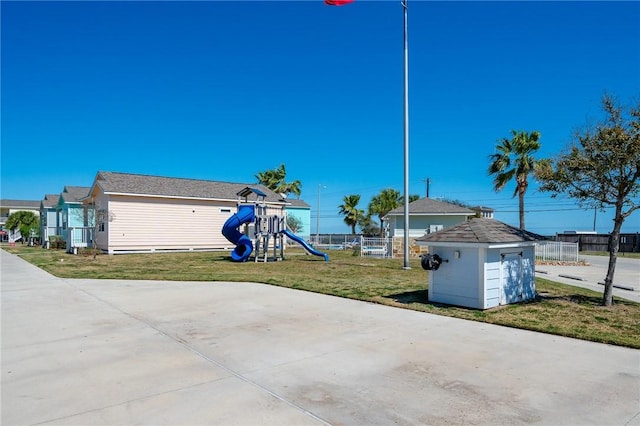 exterior space featuring a yard and fence