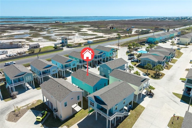 birds eye view of property featuring a residential view and a water view